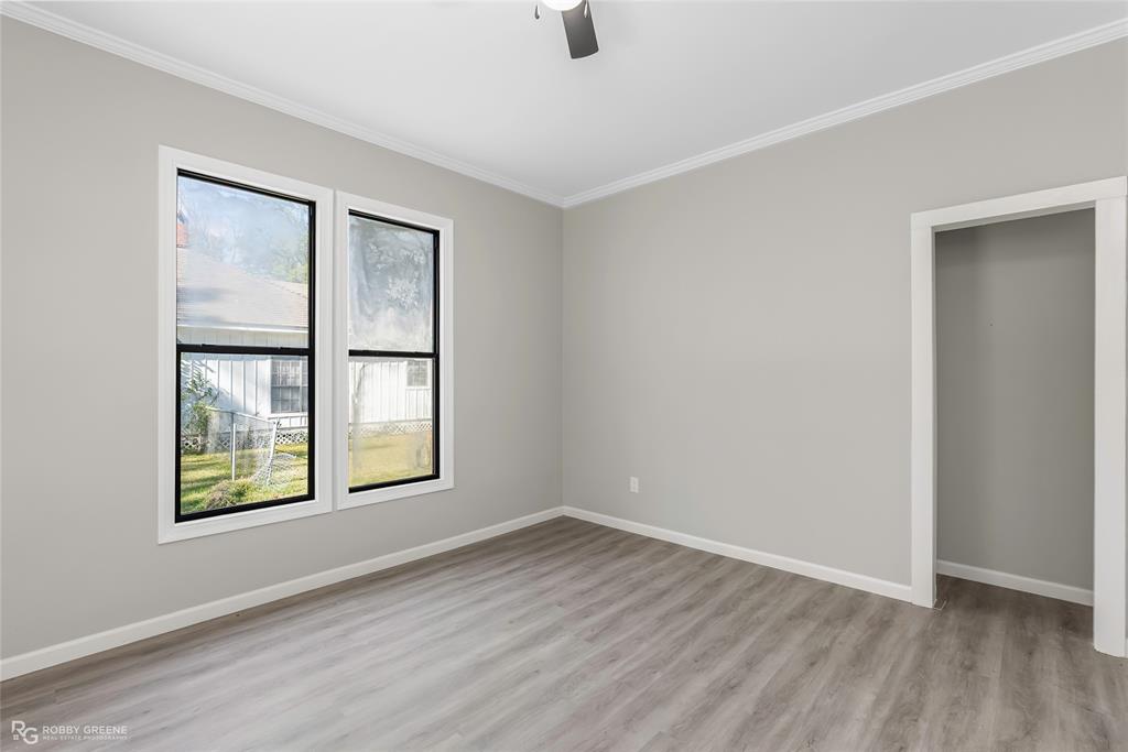 3112 Standard Oil Road Shreveport, LA 71108 - Photo 21 of 24 an empty room with windows and closet