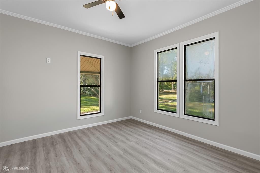 3112 Standard Oil Road Shreveport, LA 71108 - Photo 23 of 24 an empty room with windows and closet