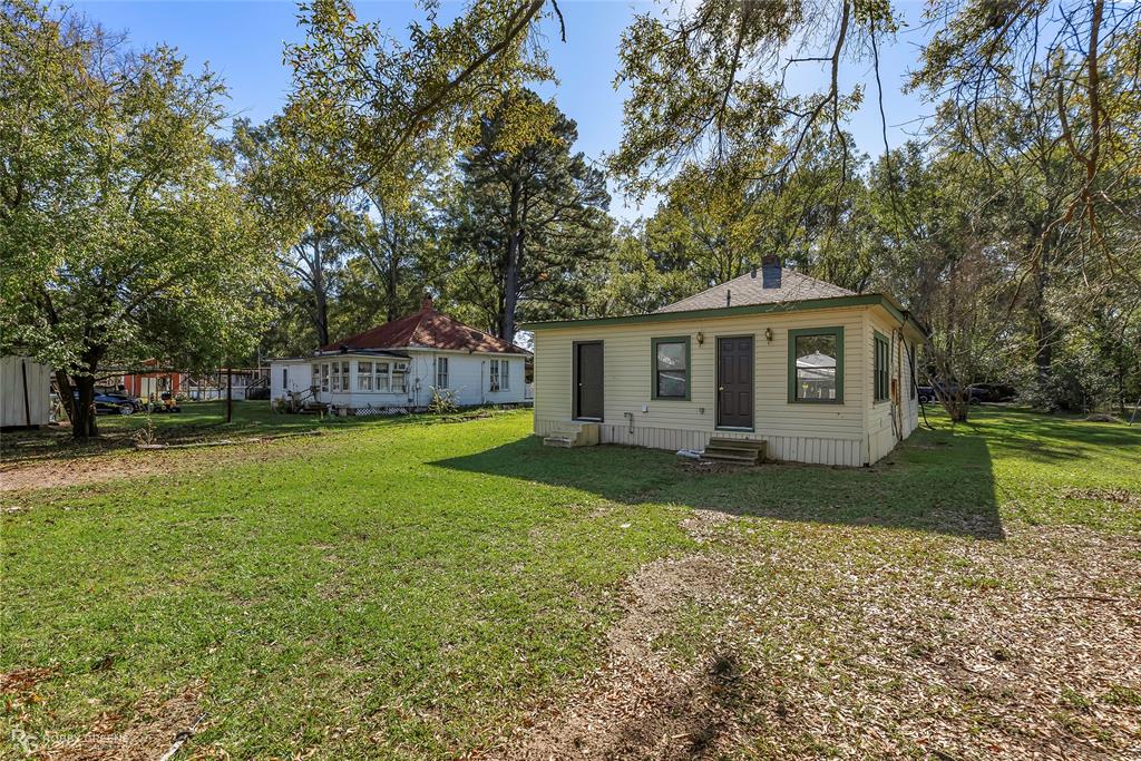 3112 Standard Oil Road Shreveport, LA 71108 - Photo 5 of 24 a view of a house with a backyard