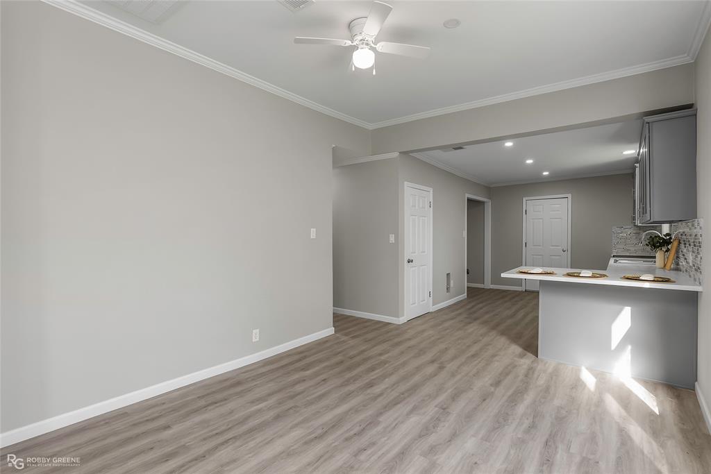 3112 Standard Oil Road Shreveport, LA 71108 - Photo 8 of 24 a view of kitchen with sink and wooden floor