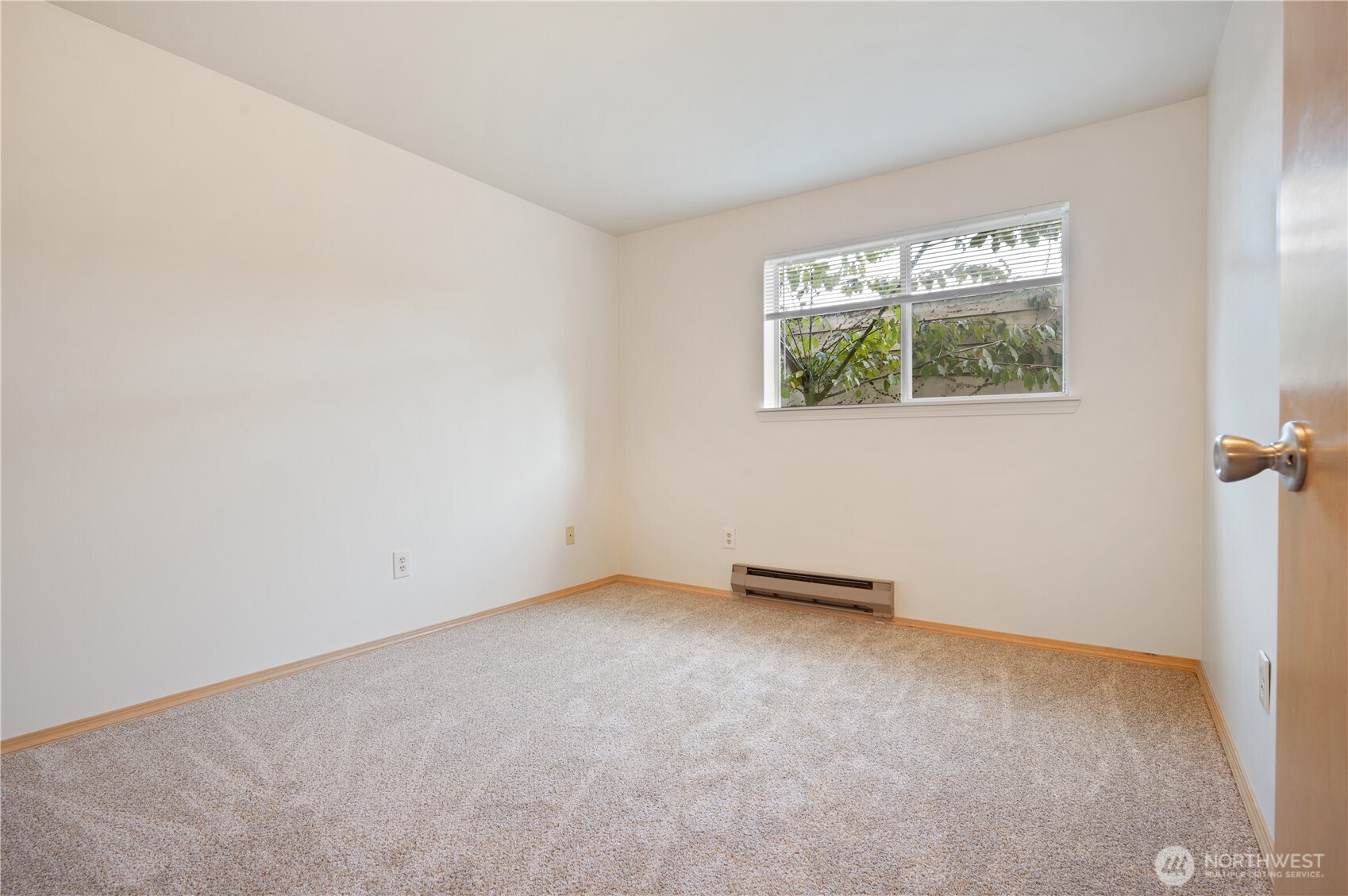 6042 Fauntleroy Way Southwest Seattle, WA 98136 - Photo 19 of 21 an empty room with windows