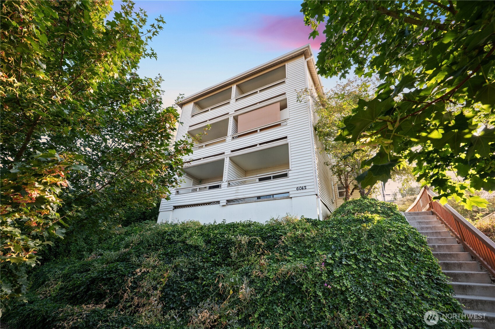 6042 Fauntleroy Way Southwest Seattle, WA 98136 - Photo 2 of 21 a backyard of a house with lots of green space