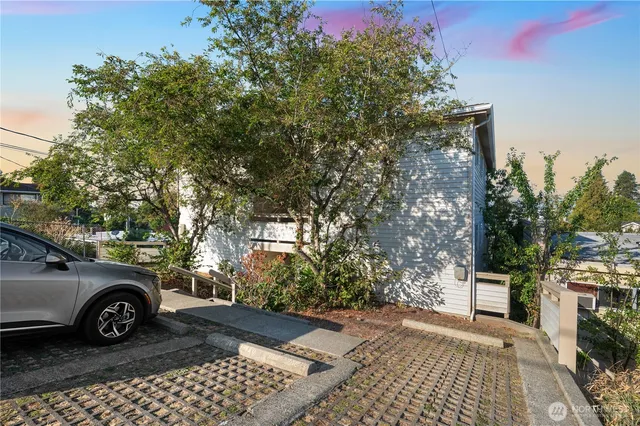 a view of a car parked on the side of the road