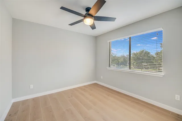 a view of a house with a yard and garage