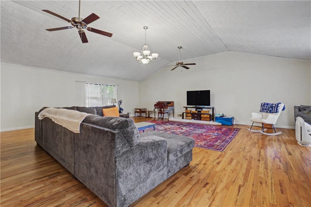 5075 Deen Road Marietta, GA 30066 - Photo 14 of 37 a living room with furniture and a flat screen tv