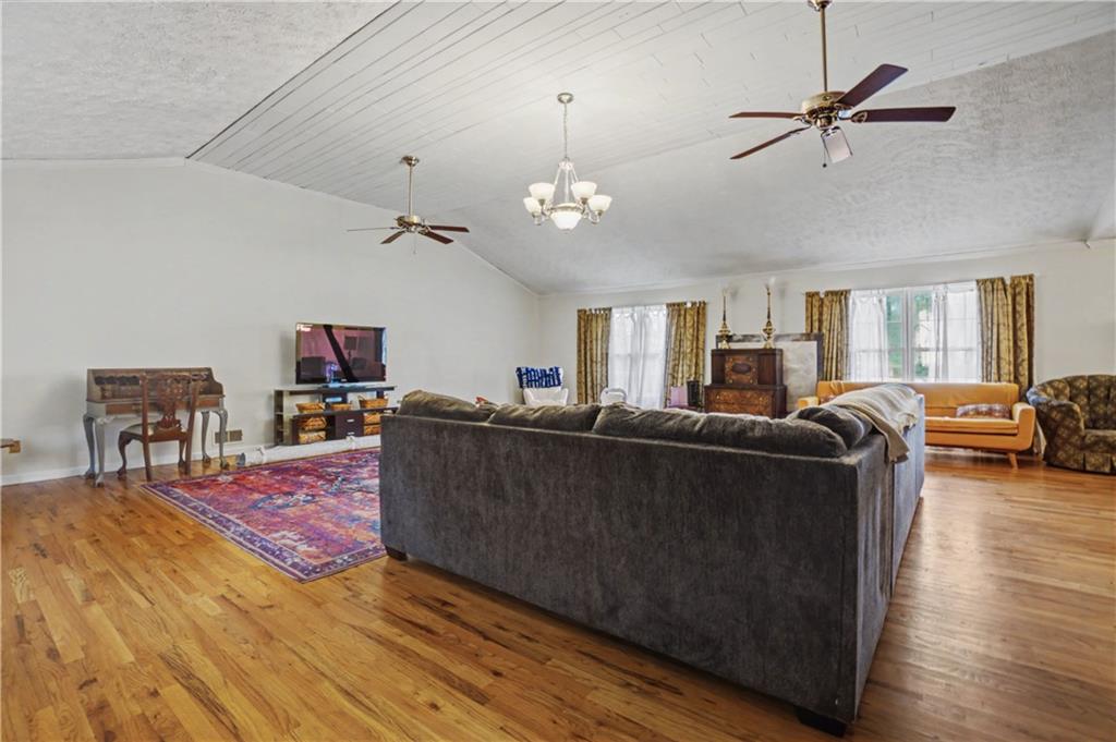 5075 Deen Road Marietta, GA 30066 - Photo 16 of 37 a living room with furniture and a wooden floor