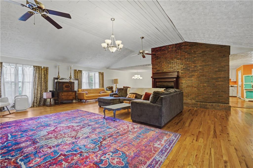5075 Deen Road Marietta, GA 30066 - Photo 17 of 37 a living room with furniture and a wooden floor