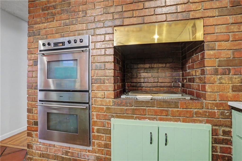 5075 Deen Road Marietta, GA 30066 - Photo 20 of 37 a stove top oven sitting inside of a kitchen