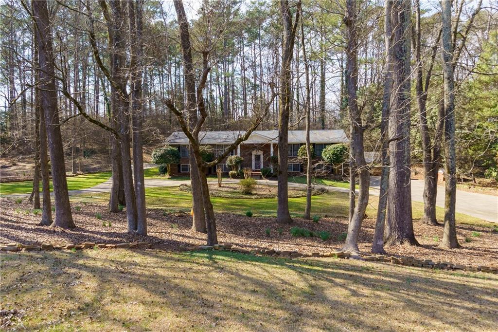 5075 Deen Road Marietta, GA 30066 - Photo 2 of 37 a view of a house with a backyard