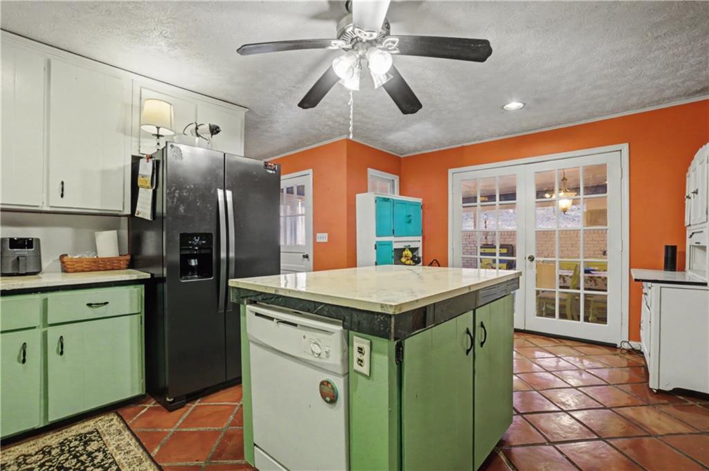 5075 Deen Road Marietta, GA 30066 - Photo 21 of 37 a kitchen with a stove a refrigerator and a sink