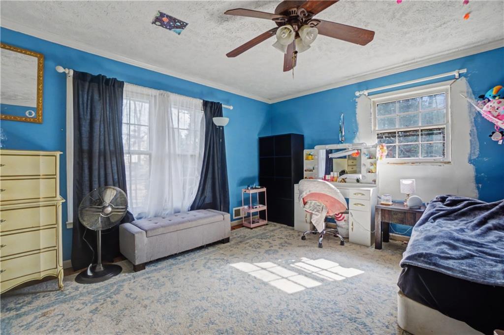 5075 Deen Road Marietta, GA 30066 - Photo 28 of 37 a bedroom with furniture and a window