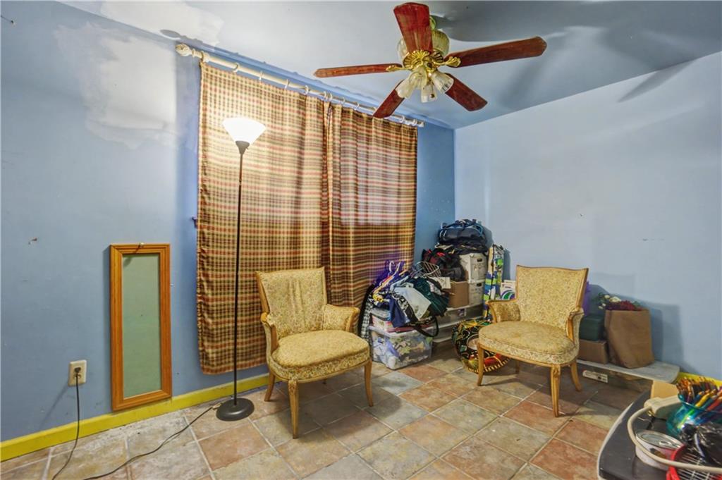 5075 Deen Road Marietta, GA 30066 - Photo 34 of 37 a living room with furniture and a window