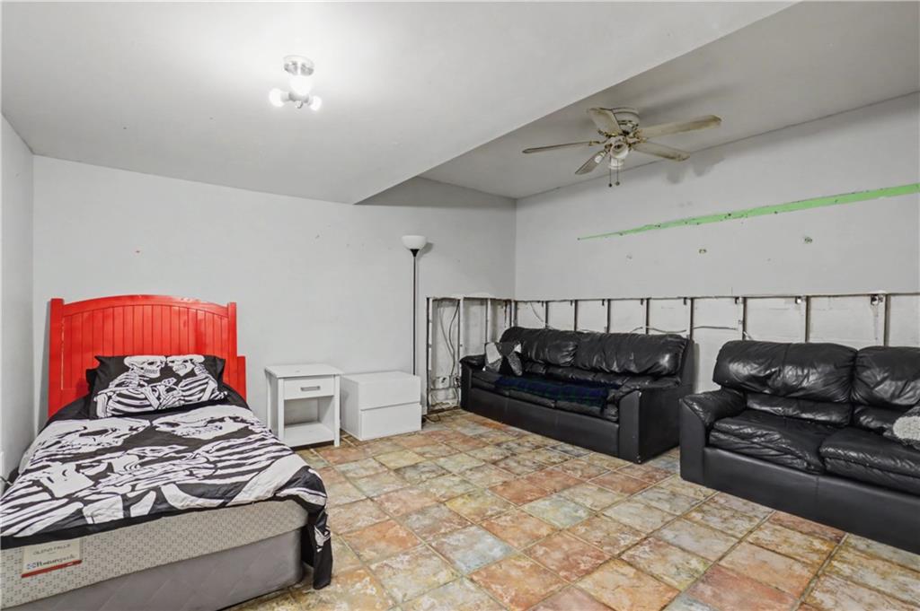 5075 Deen Road Marietta, GA 30066 - Photo 36 of 37 a bedroom with a bed and a couch