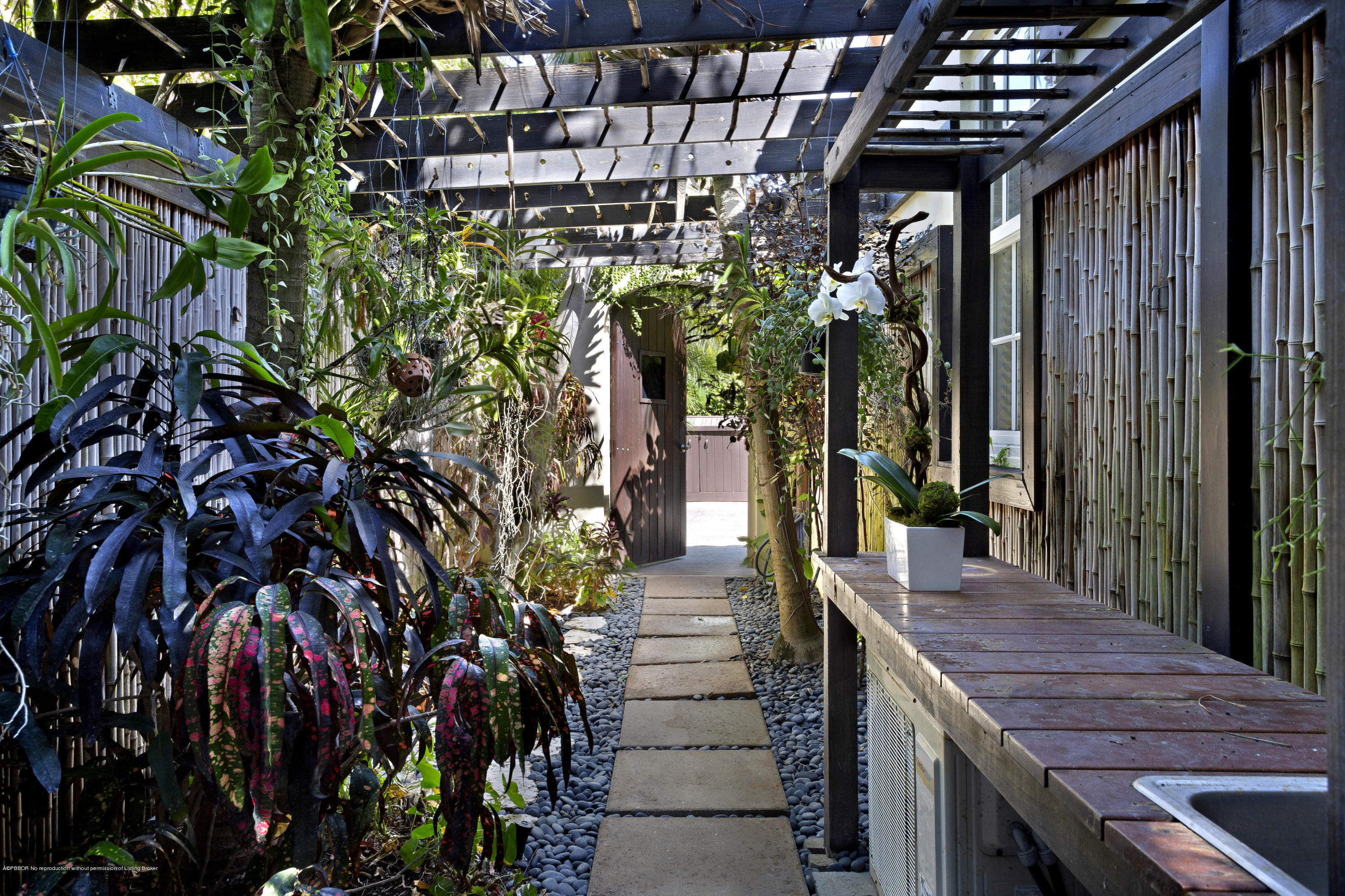 140 Seagate Road Palm Beach, FL 33480 - Photo 20 of 24 ORCHID GARDEN ENTRY (WEST)