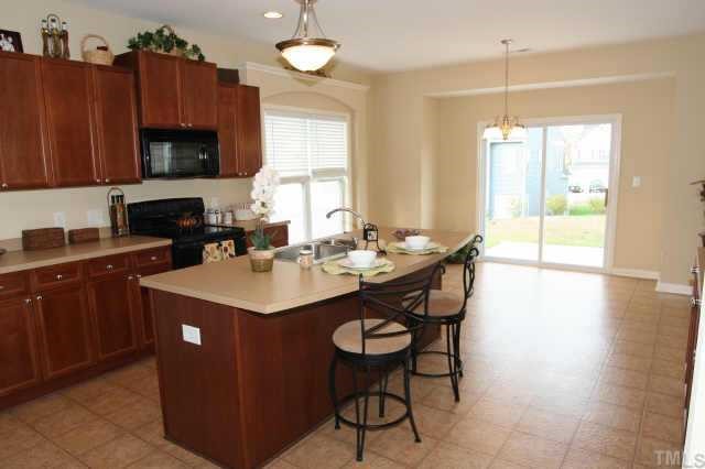3237 Landing Falls Lane Raleigh, NC 27616 - Photo 4 of 11 KITCHEN AND BREAKFAST