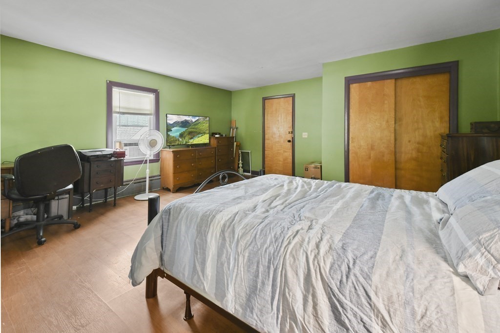 9 Dervin Place Clinton, MA 01510 - Photo 13 of 20 a bedroom with a bed chair and window