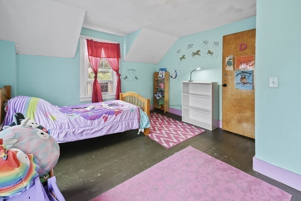 9 Dervin Place Clinton, MA 01510 - Photo 14 of 20 a bedroom with a bed and a window
