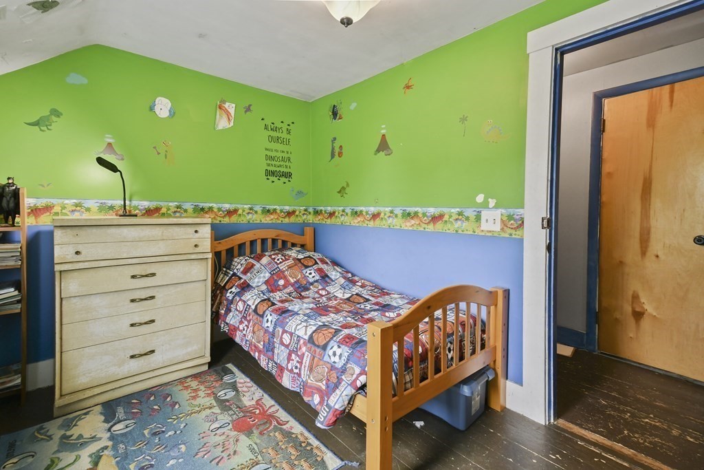 9 Dervin Place Clinton, MA 01510 - Photo 17 of 20 a bedroom with a bed and a dresser