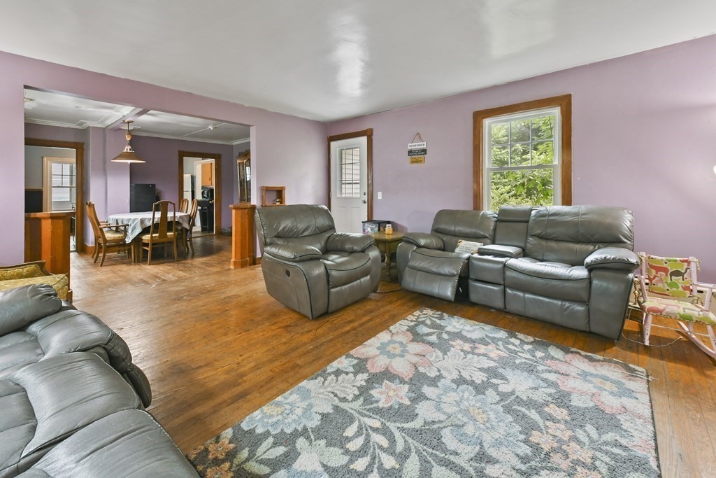 9 Dervin Place Clinton, MA 01510 - Photo 4 of 20 a living room with furniture and a large window