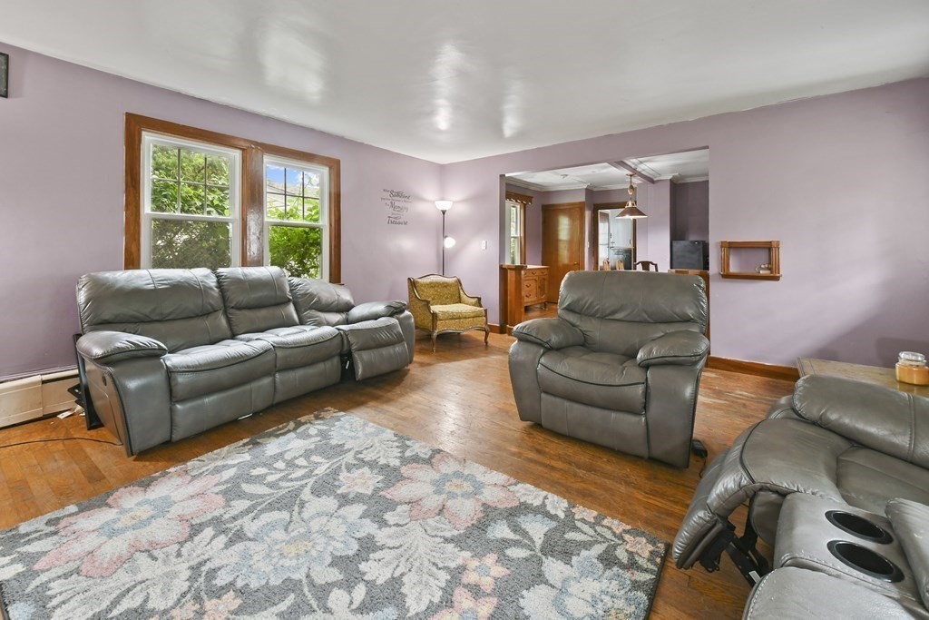 9 Dervin Place Clinton, MA 01510 - Photo 5 of 20 a living room with furniture and a large window