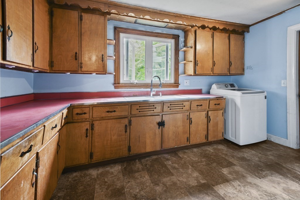 9 Dervin Place Clinton, MA 01510 - Photo 8 of 20 a utility room with a sink washer and dryer