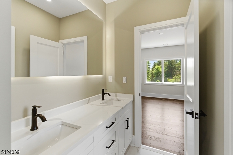 45 Kildee Road Belle Mead, NJ 08502 - Photo 23 of 43 a bathroom with a sink and a mirror