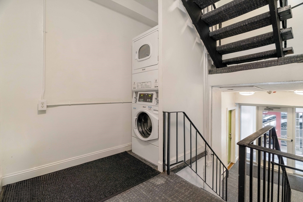 5 North Margin Street, Unit 9 Boston, MA 02113 - Photo 12 of 17 a view of a hallway with entryway wooden floor and front door