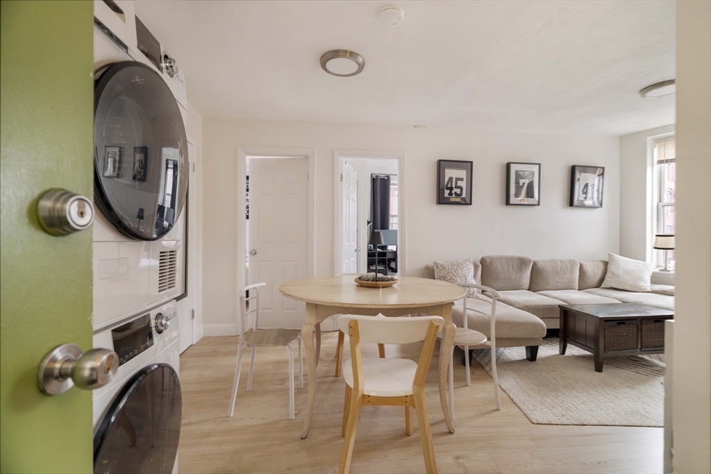 5 North Margin Street, Unit 9 Boston, MA 02113 - Photo 2 of 17 a view of a livingroom with furniture and a table