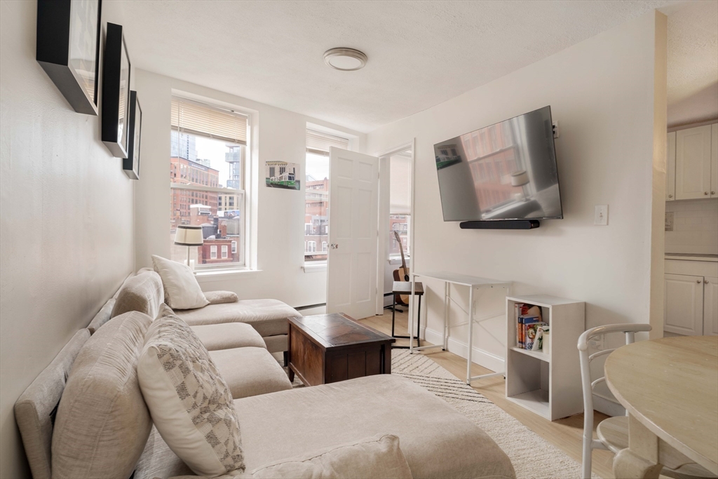 5 North Margin Street, Unit 9 Boston, MA 02113 - Photo 5 of 17 a bedroom with furniture and a window