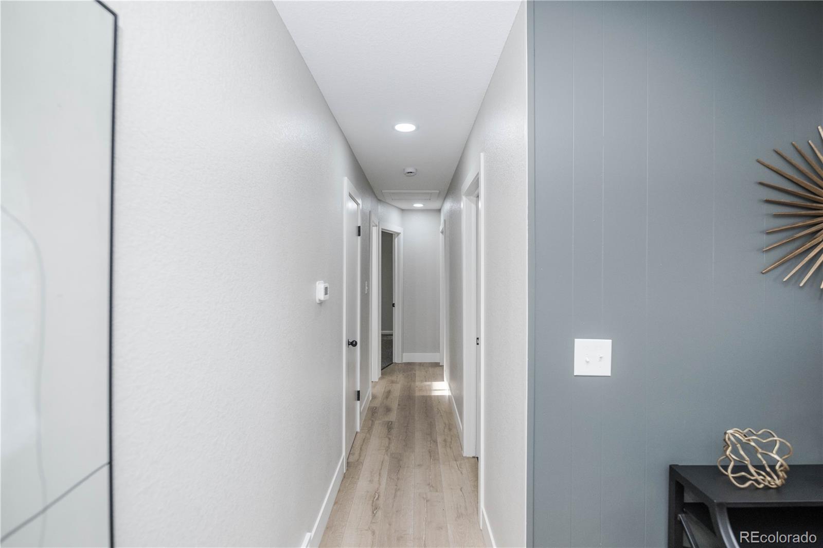 820 Drake Street Denver, CO 80221 - Photo 13 of 48 a view of hallway with furniture