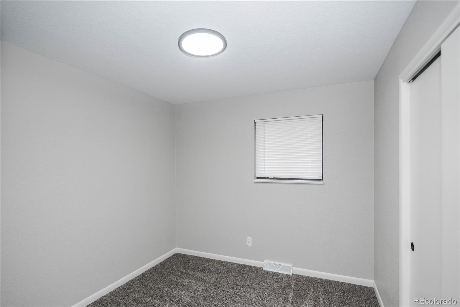 820 Drake Street Denver, CO 80221 - Photo 14 of 48 a view of a small space with a window