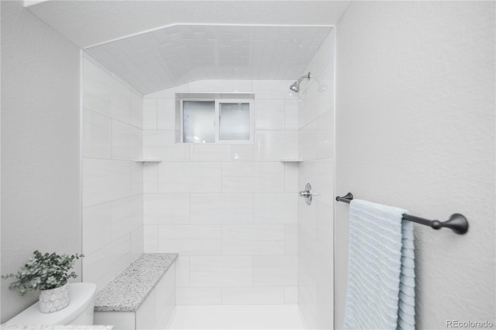 820 Drake Street Denver, CO 80221 - Photo 27 of 48 a bathroom with a shower