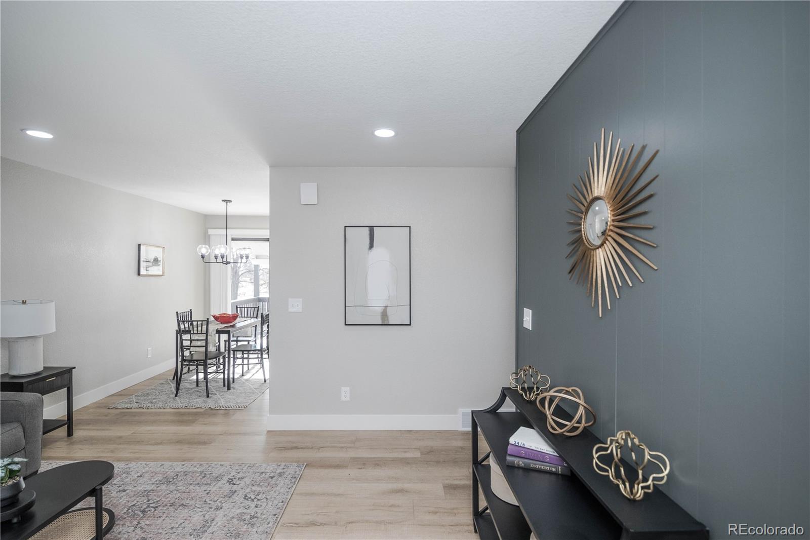 820 Drake Street Denver, CO 80221 - Photo 3 of 48 a view of room with furniture and wooden floor