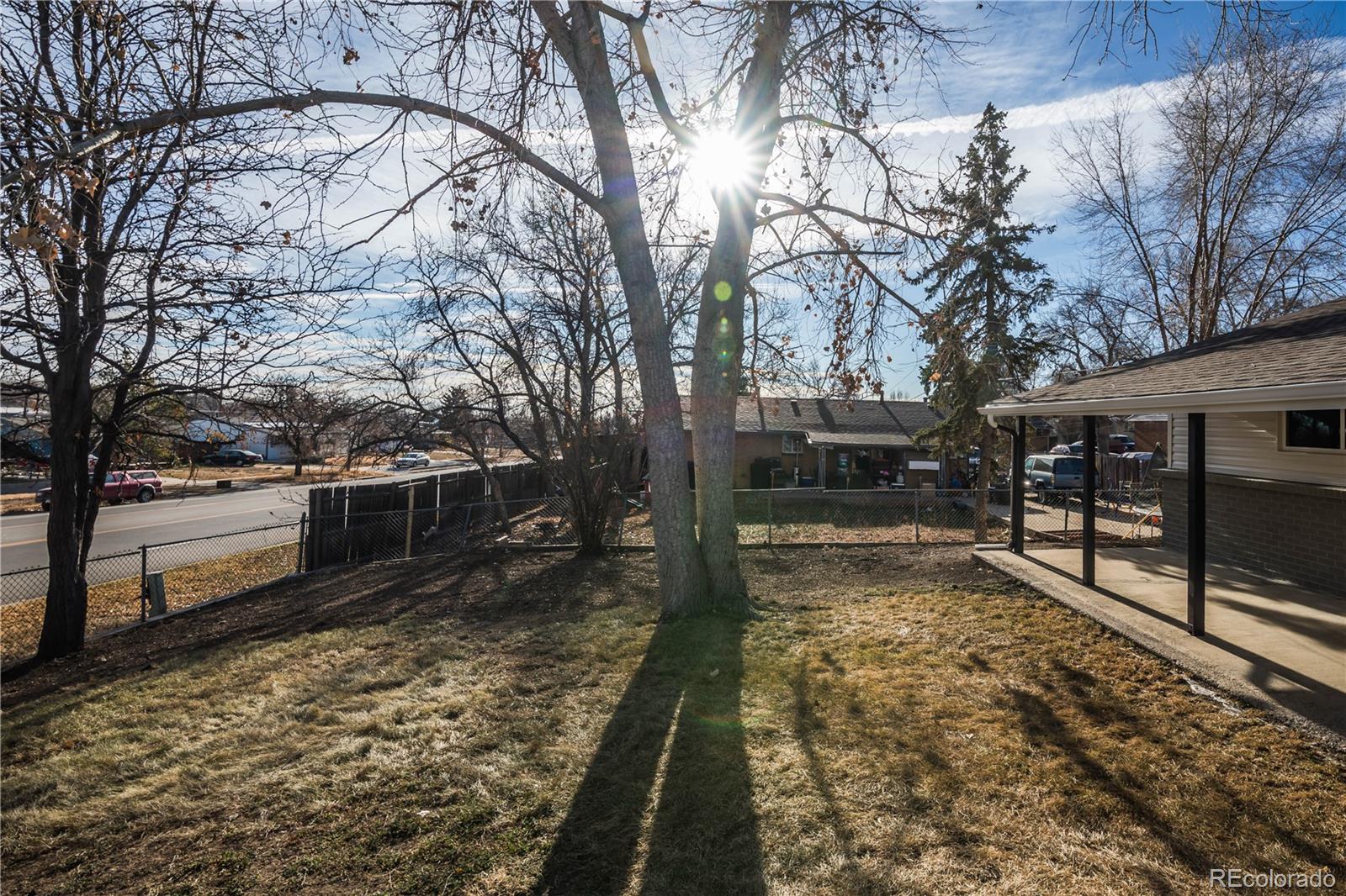 820 Drake Street Denver, CO 80221 - Photo 34 of 48 a view of a yard with wooden fence