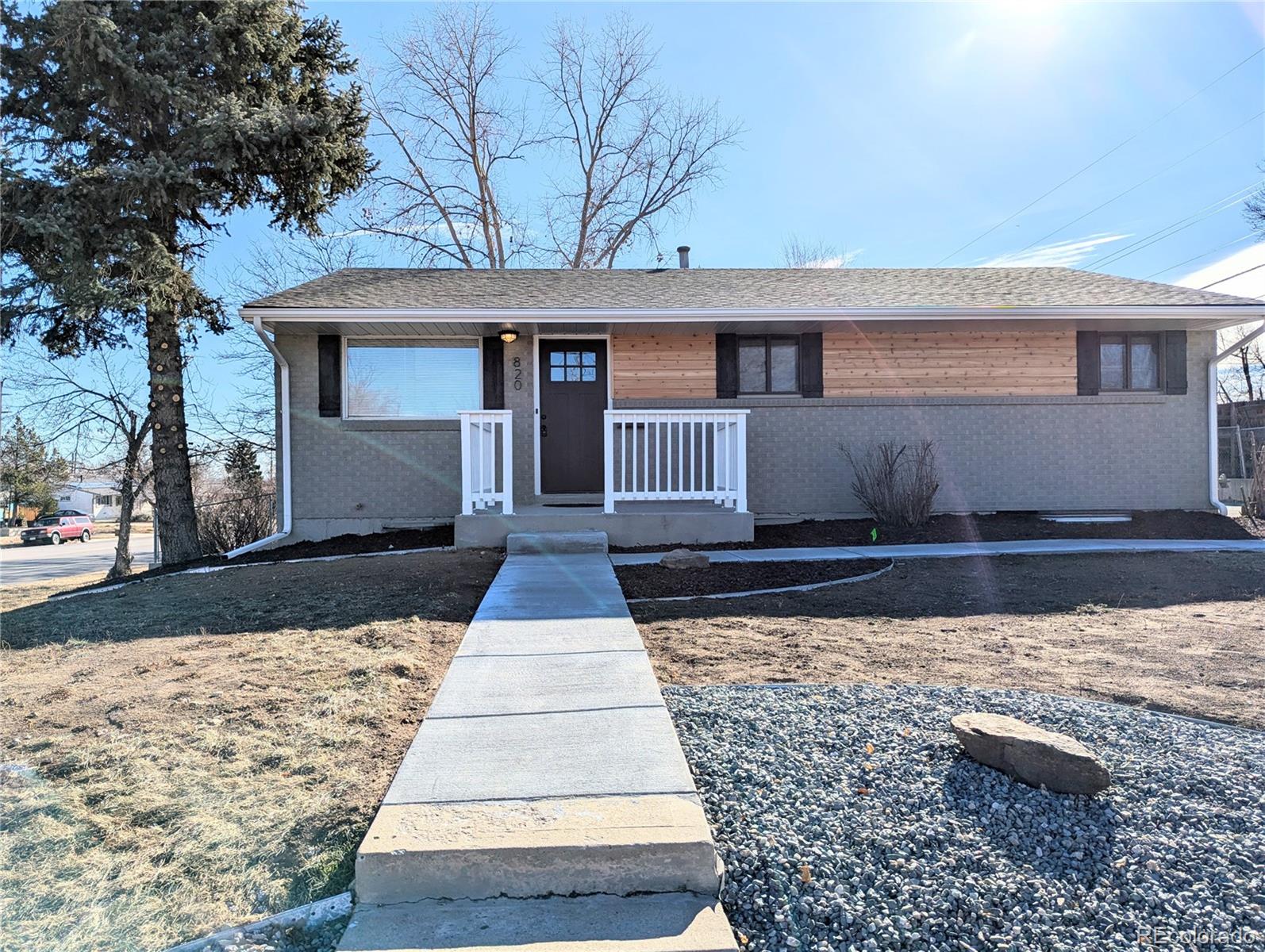 820 Drake Street Denver, CO 80221 - Photo 42 of 48 a front view of a house