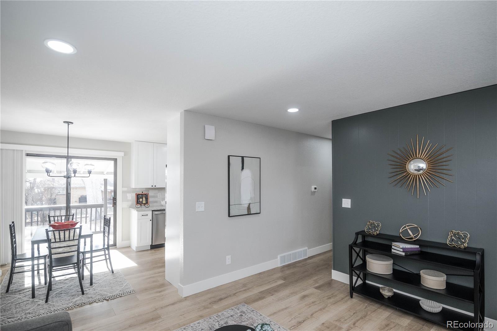 820 Drake Street Denver, CO 80221 - Photo 6 of 48 a living room with furniture and a window