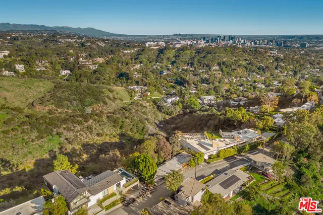 an aerial view of residential house with parking space
