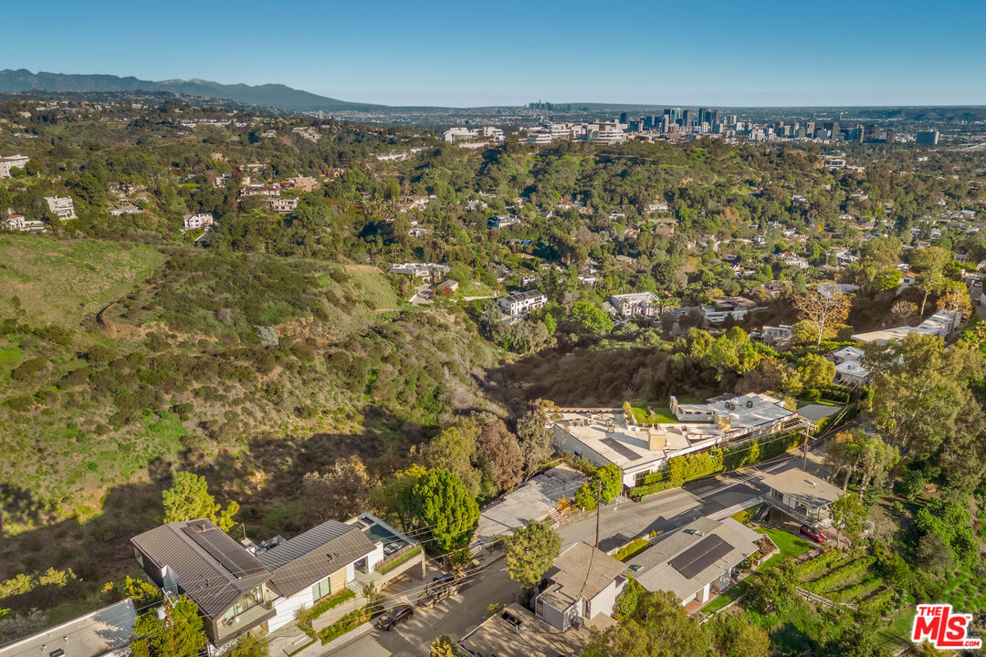 1128 North Tigertail Road Los Angeles, CA 90049 - Photo 4 of 7 an aerial view of residential house with parking space