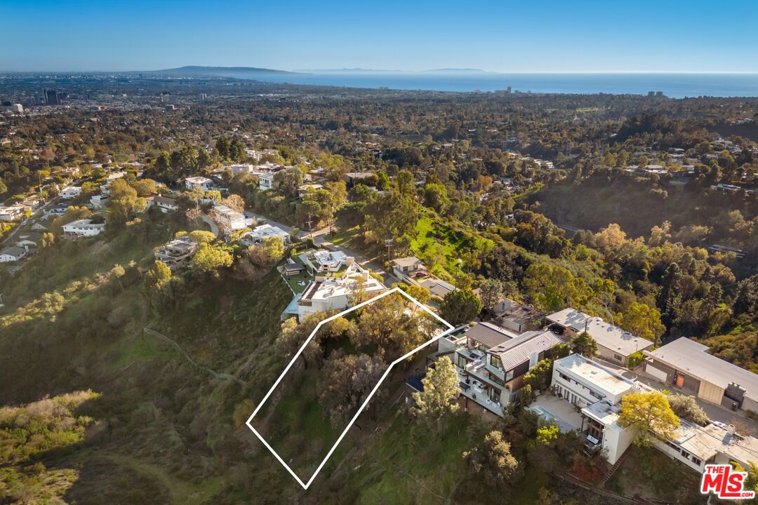 1128 North Tigertail Road Los Angeles, CA 90049 - Photo 6 of 7 an aerial view of multiple house