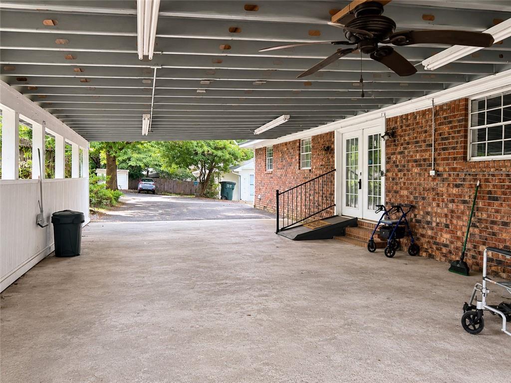 212 Craigtown Road Northeast Calhoun, GA 30701 - Photo 19 of 21 a view of a porch with furniture and a window