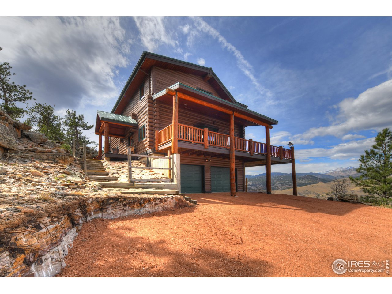 370 Blue Mountain Trail Lyons, CO 80540 - Photo 34 of 37 a house view with a outdoor space