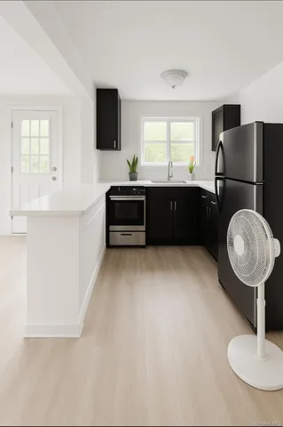 a living room with a couch and a flat screen tv