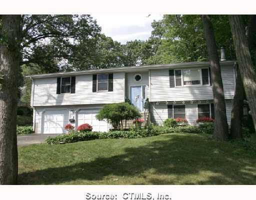 55 Norton Road New Britain, CT 06053 - Photo 1 of 1 a front view of house with a garden