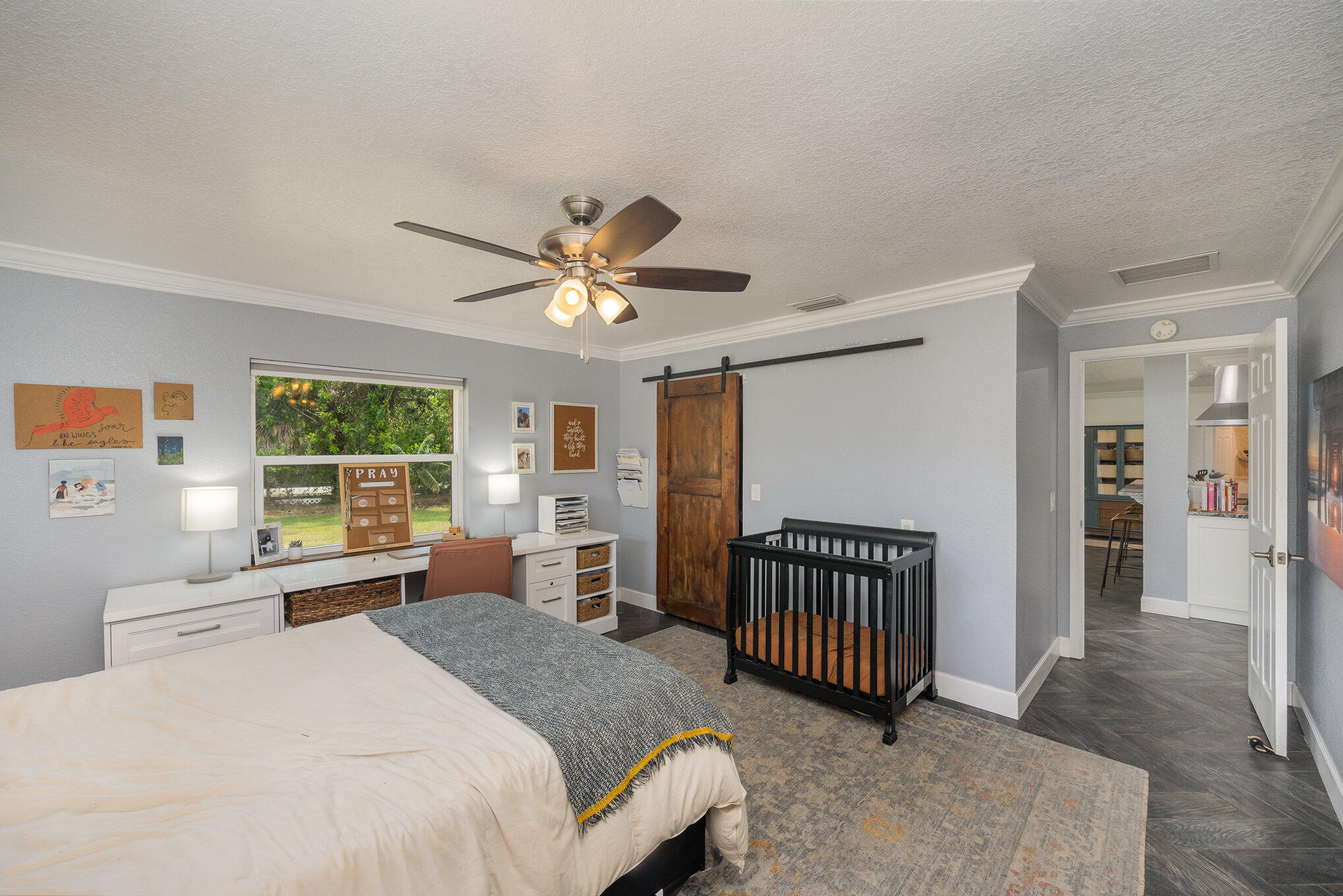 3650 Corey Road Malabar, FL 32950 - Photo 19 of 40 a bedroom with a bed furniture and a window