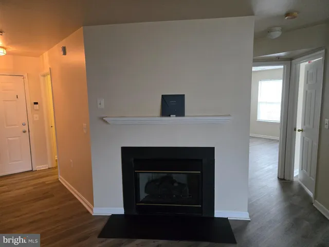 a living room with a fireplace