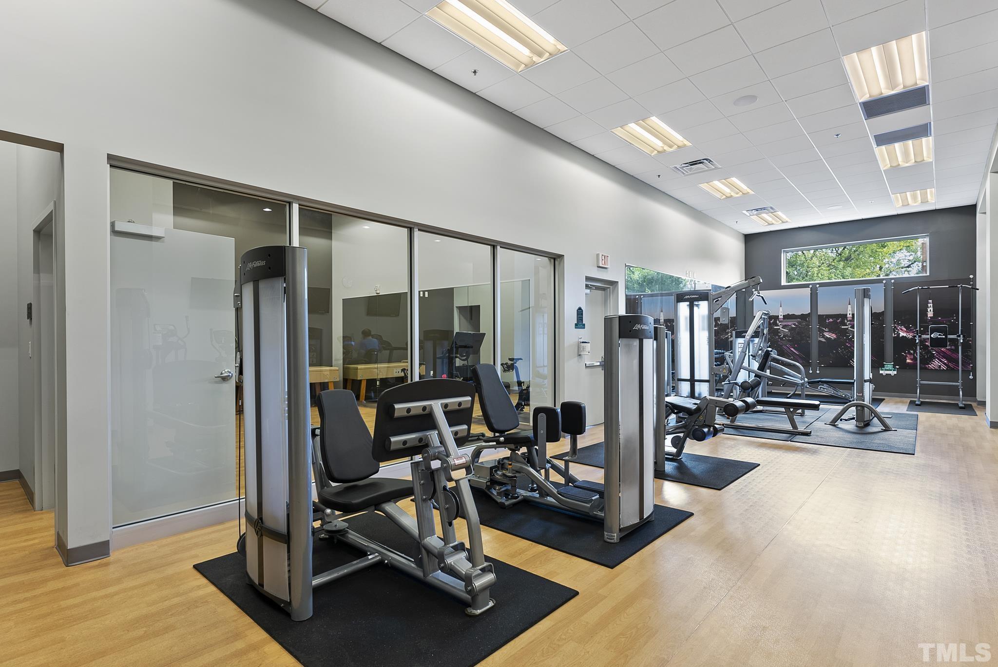 140 West Franklin Street, Unit 415 Chapel Hill, NC 27516 - Photo 16 of 29 a view of a room with gym equipment