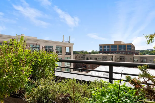a balcony with a city view