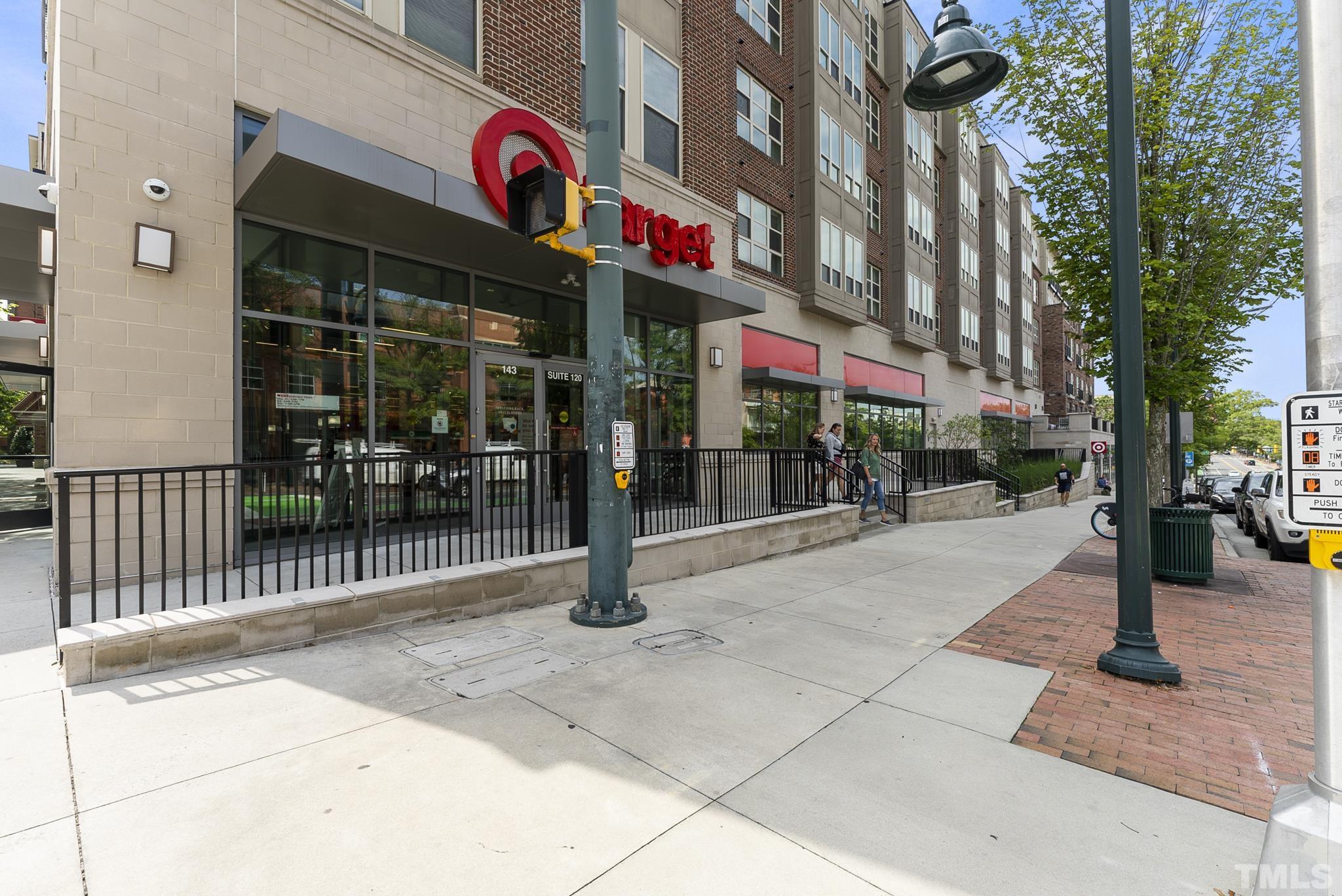 140 West Franklin Street, Unit 415 Chapel Hill, NC 27516 - Photo 28 of 29 a street sign of a large building