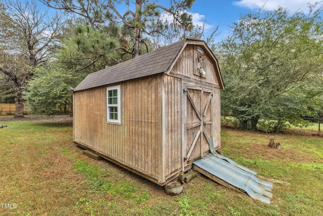 a front view of a house with glass windows