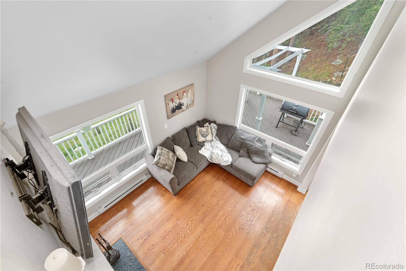 137 Bob Cat Trail Bailey, CO 80421 - Photo 20 of 46 a living room with furniture and a table